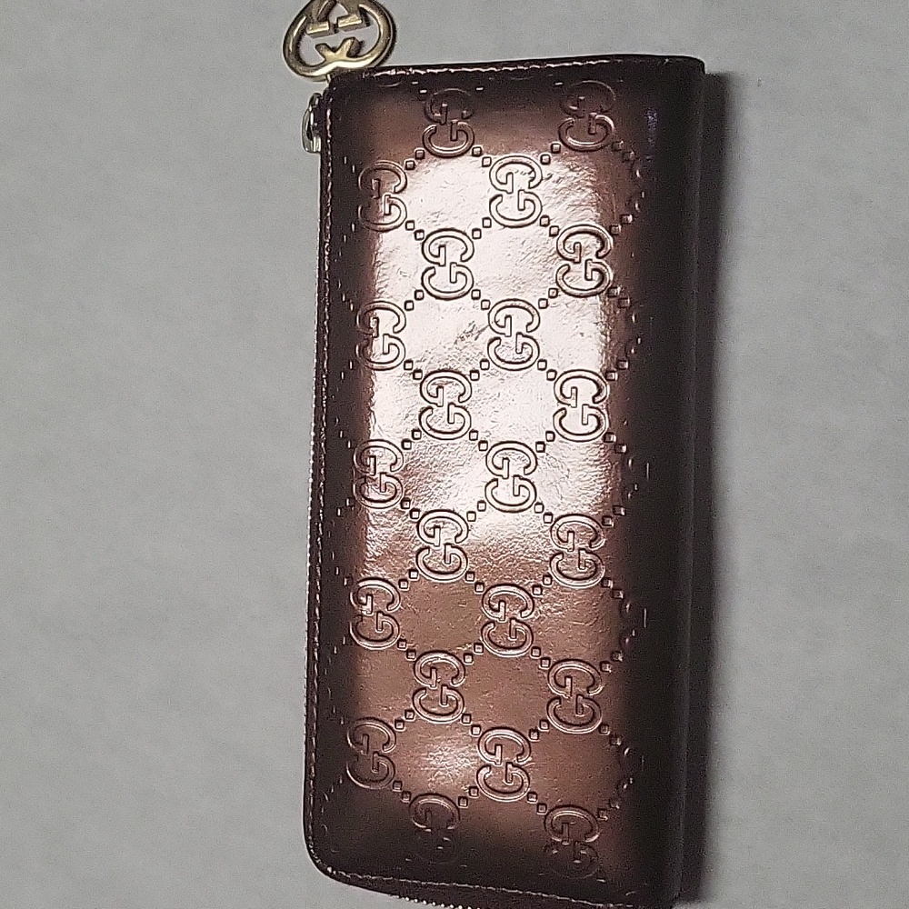 Gucci heart charm zip around wallet